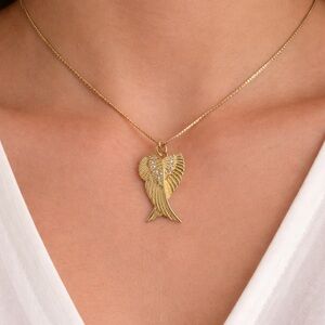 Cross and wings with paveè in needle box chain bundle